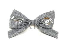 Load image into Gallery viewer, RIBBED BOW CLIP WITH FOIL WINK