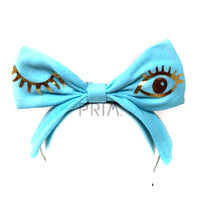 Load image into Gallery viewer, RIBBED BOW HEADBAND WITH FOIL WINK