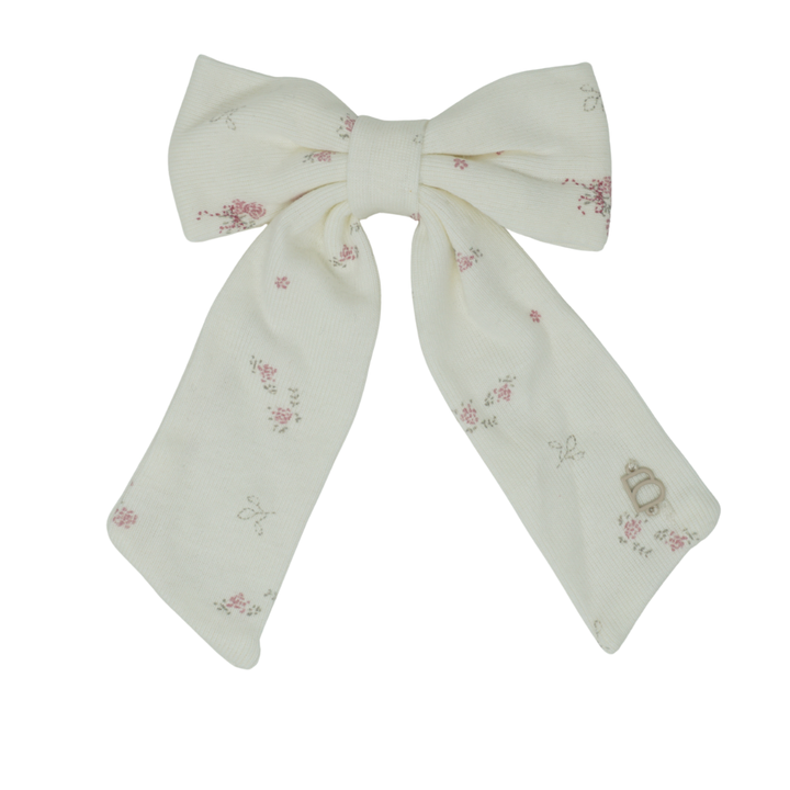clip dainty prints on soft stretch fabric bow