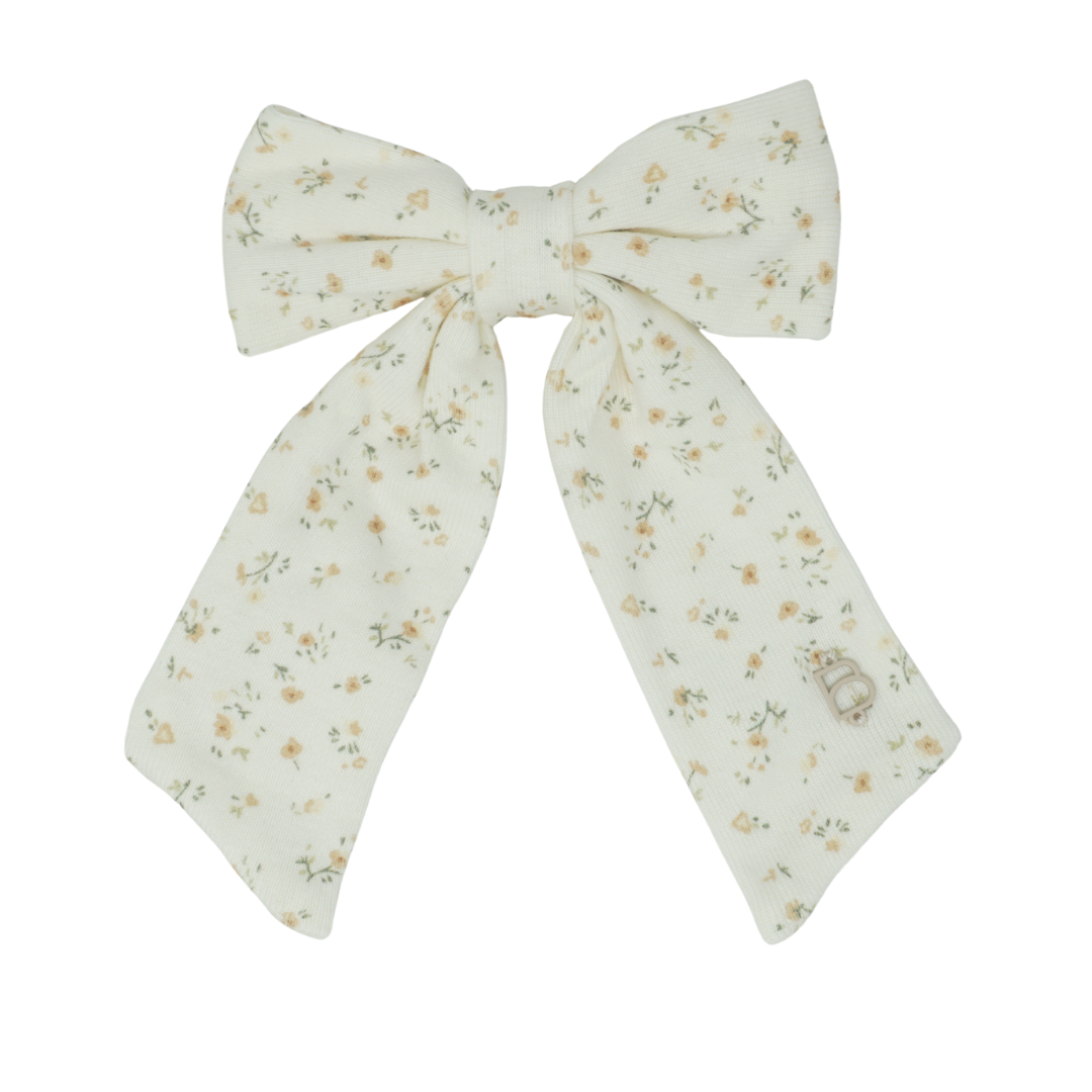 clip dainty prints on soft stretch fabric bow