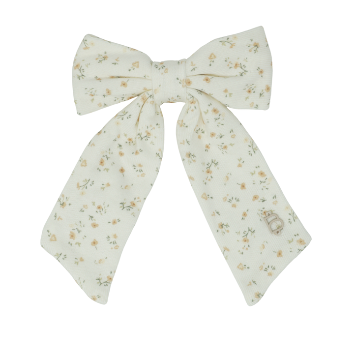 clip dainty prints on soft stretch fabric bow