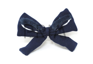 LARGE FURY EYEBROWS BOW CLIP
