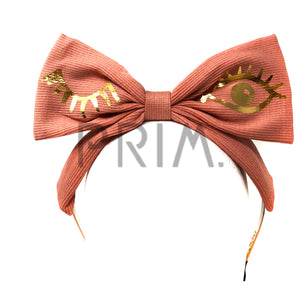 RIBBED BOW HEADBAND WITH FOIL WINK